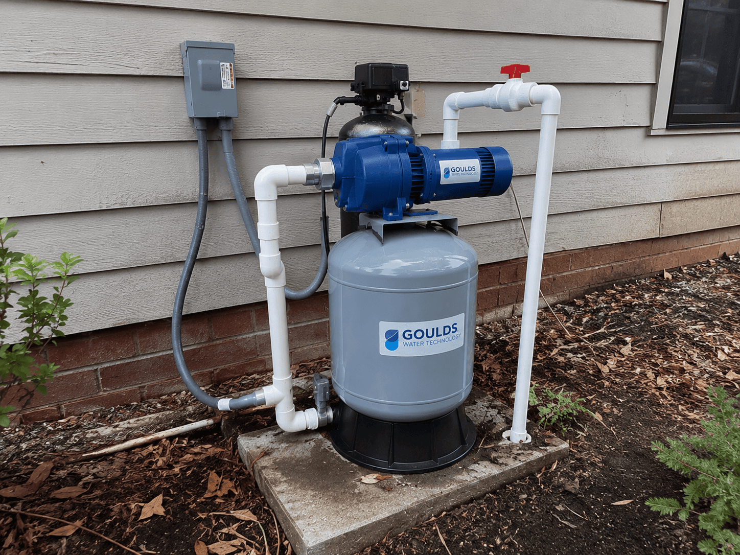 Professional pump service technician working on residential pump equipment